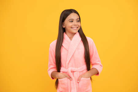 good pleasant morning. kid wear soft night suit. child in cozy sleepwear. skin beauty.の写真素材
