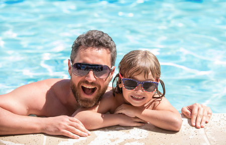 daddy with kid boy on spa resort. summer holidays weekend at family day.の写真素材