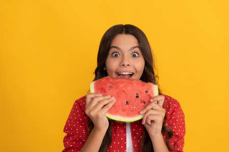 happy kid eat fresh ripe water melon slice fruit, vitaminsの写真素材