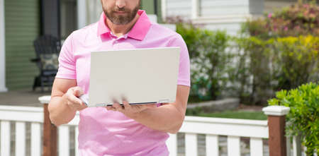 cropped broker. mortgage insurer. american sales manager. real estate agent at house for sale.の写真素材