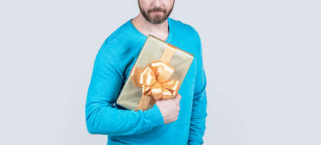 cropped man with beard holding present or gift box, saleの写真素材