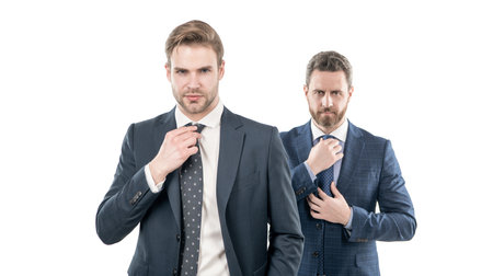 two successful entrepreneur in suit tie necktie isolated on white, businesslikeの写真素材