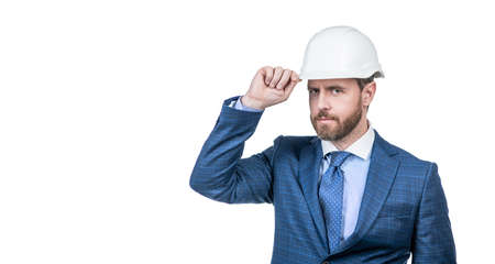 confident businessman man in suit and safety helmet isolated on white copy space, helloの写真素材