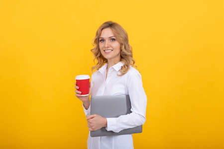 If you feel tired take break. Happy career girl hold paper cup. Tea break at workの写真素材