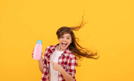 daily habits and personal care. presenting cosmetic product. beauty. kid use shower gel.の写真素材