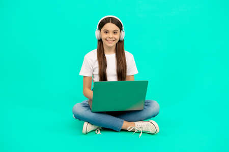 video call. child chatting on computer. buy online. back to school. teen influencer blogging.の写真素材