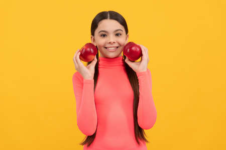 childhood health. natural organic fresh apple. healthy life. diet and kid beauty. dental care.の写真素材