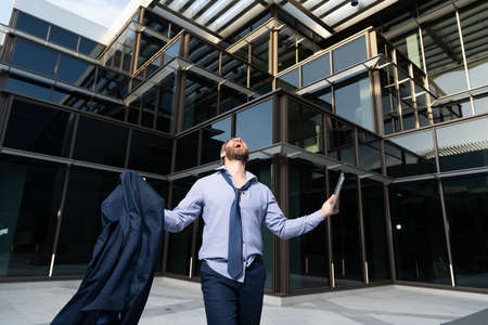 confused man frustrated by business problem. boss crying in depression.の写真素材