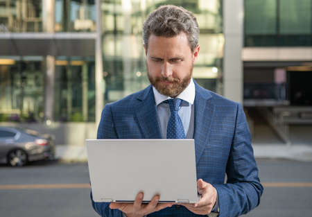 Internet access. check email. freelancer man post blog online. writing online. businessmanの写真素材