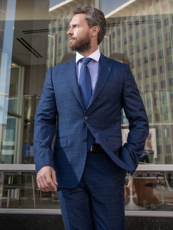 business success. successful man in businesslike suit. manager executive outside the office.の写真素材