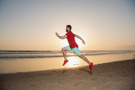 runner feel freedom. hurry up. endurance and stamina. sprinter. sport athlete run fastの写真素材