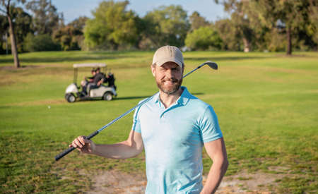 summer activity. professional sport outdoor. male golf player on professional golf course.の写真素材