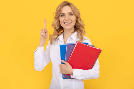 inspiration. inspired woman with idea in white shirt. office worker with notebook.の写真素材