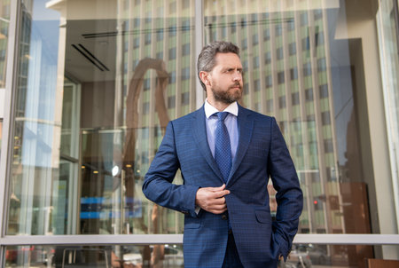 serious mature business man in formalwear outdoor, business fashionの写真素材