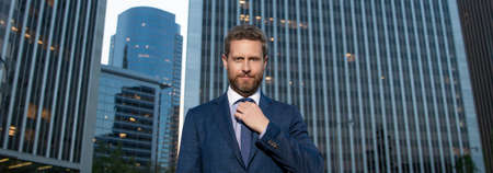 stylish businessperson in businesslike suit outside the office, businessの写真素材