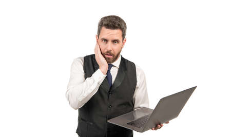 confused business man with laptop isolated on white background, business problem