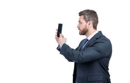 Video call right from your smartphone. Businessman make video call. Using mobile phone for callingの写真素材