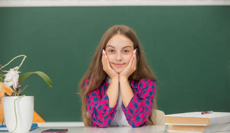 child ready to study. teen girl smile back to school. knowledge day. education concept.の写真素材