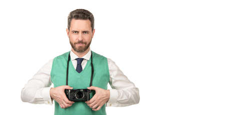 smiling guy with retro camera isolated on white backdrop, copy space, photoshootの写真素材
