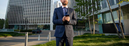 modern communication technology. man blogger use smartphone.の写真素材