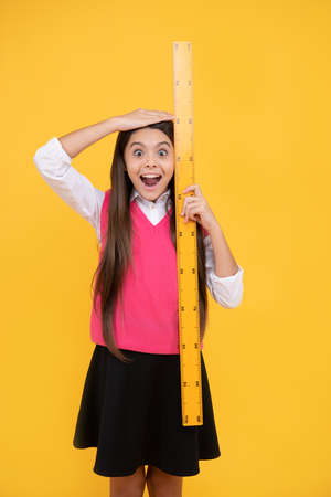 wow. kid study math. stem disciplines. concept of education. measure the size. height of child.