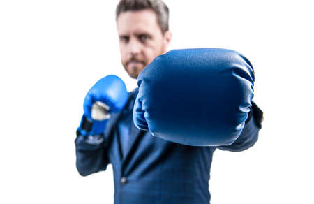 I punch hard. Businessman wear boxing gloves selective focus. Punch is my powerの写真素材