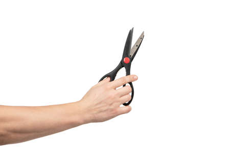scissors barber tool in hand isolated on white, stationery