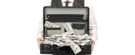 cropped briber holding case full of dollar cash isolated on white background, corruptionの写真素材