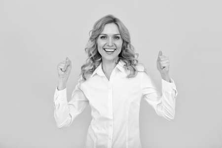 happy successful businesswoman woman in white shirt hold thumb up, successの写真素材