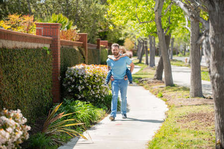 dad with kid on summer day. parenting and fatherhood. fathers day. funny father and son
