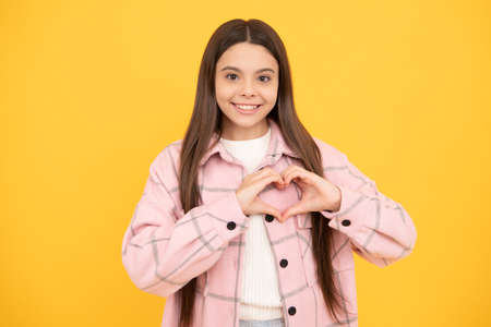 beauty and fashion. latest trend. street autumn fashion. happy teen girl in pink checkered shirt.