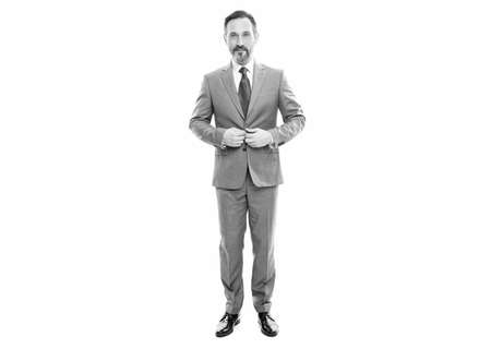 smiling grizzled boss in businesslike suit full length isolated on white, business person