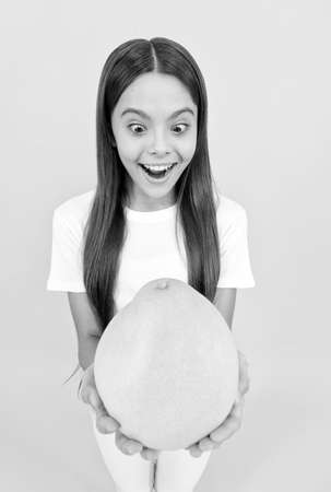 dieting and vitamin. healthy food eating. childhood health. big exotic citrus fruits.の写真素材