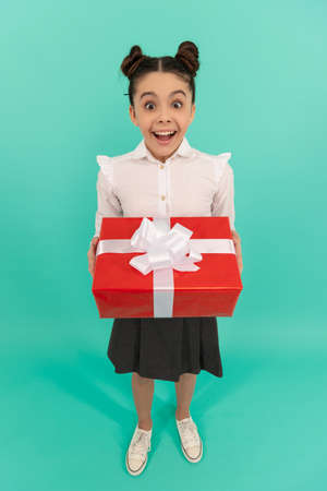 amazed kid with box. birthday holiday. black friday discount. seasonal sales.