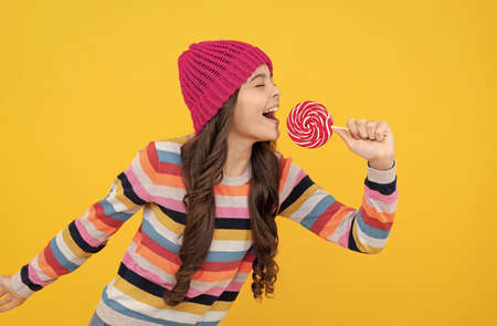 happy kid girl hold lollipop sweet, fun