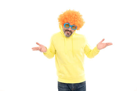 Here I am. Funky man. Bearded man wear sunglasses with orange wig. Party lookの写真素材