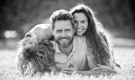 mom dad and son love relax together. adoption and charity. family day. friendship.の写真素材