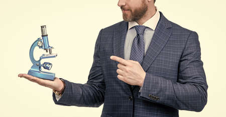 harness scientific method. science and commerce. unique medicine invention. businessmanの写真素材