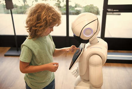 smart small boy communicate with robot assistant technology for modern education, roboticsの写真素材
