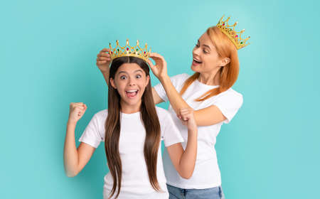 Beauty pageant winner. Beauty queen and happy winner. Woman crown girl child. Euphoria of victoryの写真素材