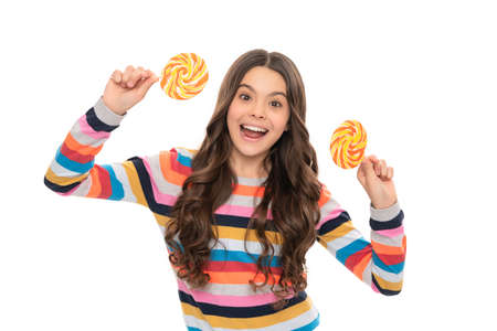 happy kid in colorful sweater with lollipop candy on stick isolated on white background, sweetの写真素材