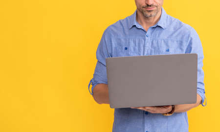 freelance man post blog online. businessman using laptop for blogging.の写真素材