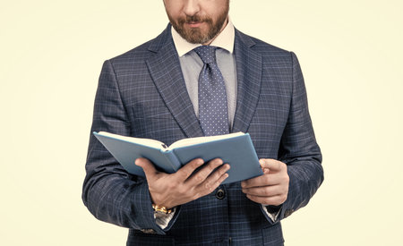 successful ceo reading schedule. cropped man planning his work. boss examine business reportの写真素材