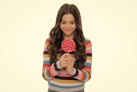 wow. sweet tooth. yummy. happy girl hold lollipop isolated on white. lollipop child.