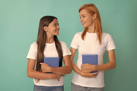 happy school pupil and student holding books, school