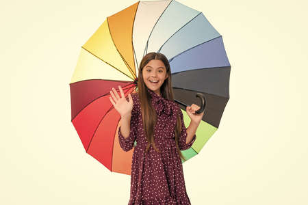 back to school. fall fashion accessory. stylish teen girl. amazed child hold colorful parasol.
