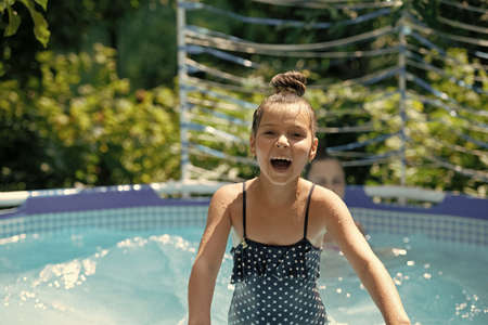 Chilling in summer. Happy child enjoy chilling in pool. Chill pool day. Summer vacationの写真素材