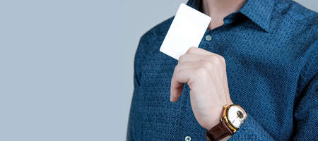 Make your card as unique as you. Empty card in male hand. Identification paper. Showpiece....