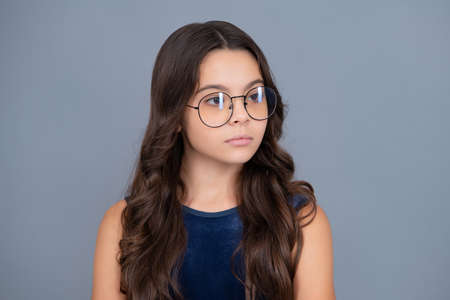Little kid girl 12,13, 14 years old on isolated background. Children studio portrait. Emotional kids...