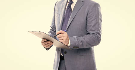 signing a contract. cropped businessman hold folder. business expertise.の写真素材